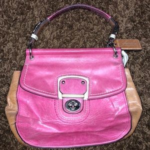 Coach pink and tan shoulder bag with a extra strap